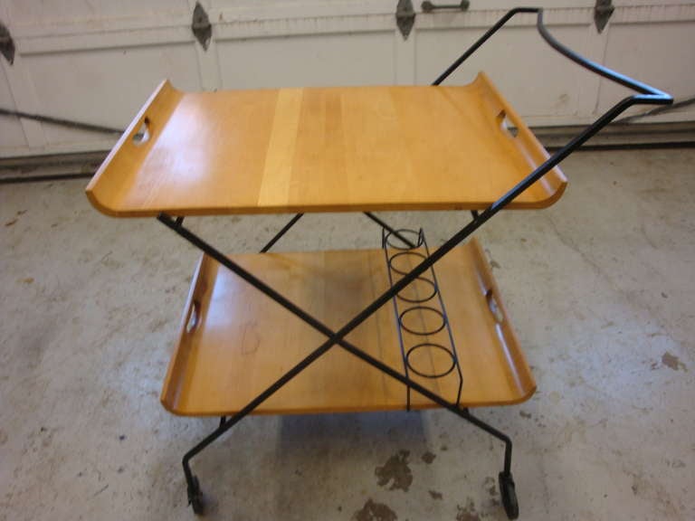 This is an iron and wood mid century bar cart from 60-70s