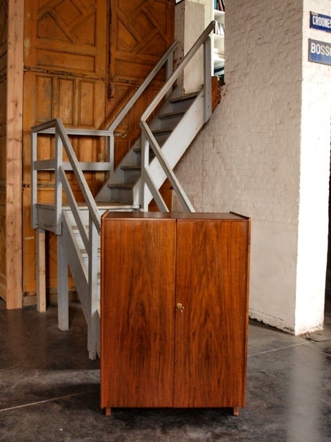Special secretaire in walnut veneer designed by Mummenthaler and Meier in 1928. It is like a magic box, cupboard when closed and a full secretaire with lots of storage shelves when open.