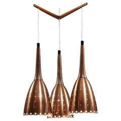 Impressive Copper Chandelier With Performated Shades And Tropic Wood Details