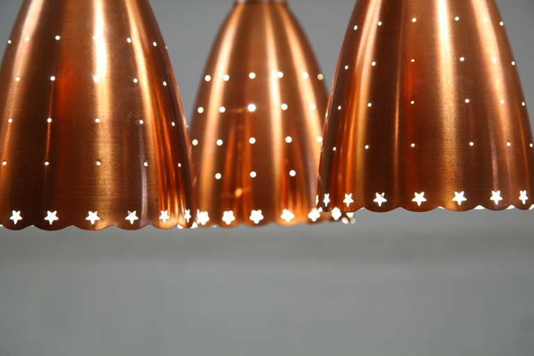 Scandinavian Modern Impressive Copper Chandelier With Performated Shades And Tropic Wood Details