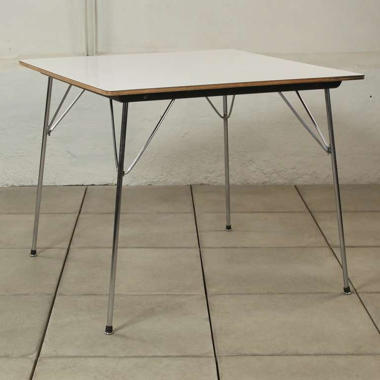 1950s DTM table by Charles Eames for Herman Miller.

White formica top and metal legs.

Ideal small dining or additional table. Perfect vintage condition with some normal signs of use on the formica.

Dimensions: 74x80x80 cm