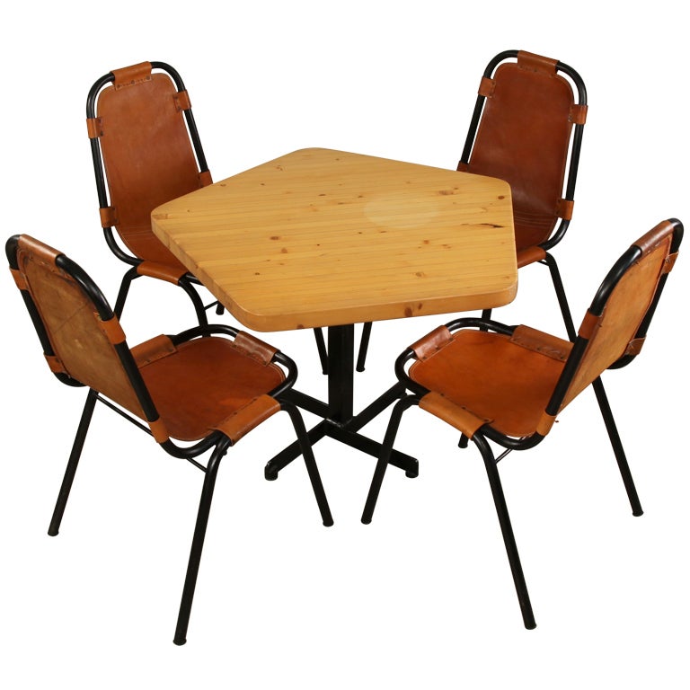 Table and matching chairs  by Charlotte Perriand for Les Arcs ski resort