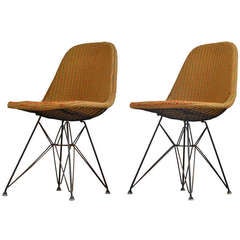 Early Eames DKR wire chairs with 'Girard' fabric
