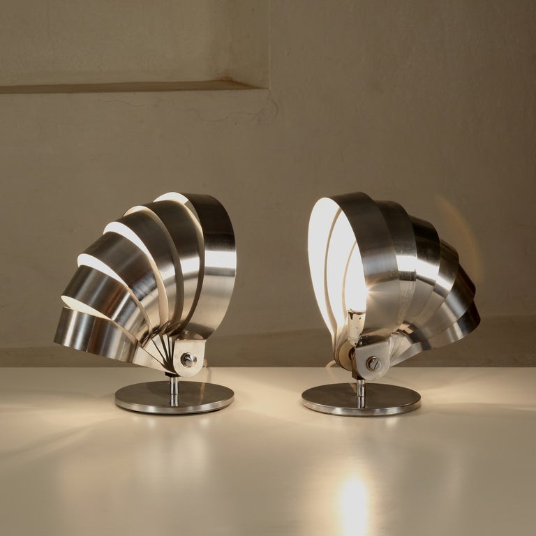 Rare Pair of Adjustable Visor table Lamps in chrome made in Switzerland by E.R Nele for Temde Leuchten. Lamps feature  unique adjustable visors, metal bases, and great modernist lines. Switzerland circa 196O.