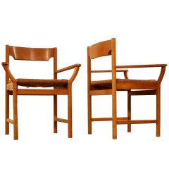 set of oak chairs designed in the mannor of Lassen Mogens. set of oak chairs designed in the mannor of Lassen Mogens.