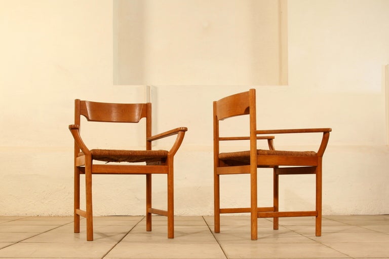 set of oak chairs designed in the mannor of Lassen Mogens.
