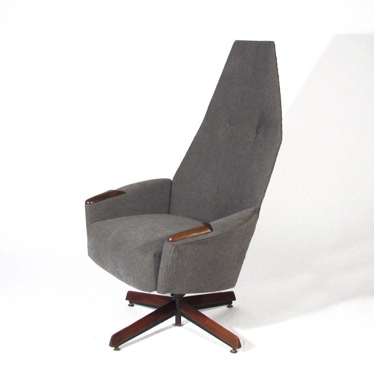 Classic Adrian Pearsall model 2174-C high back chair. Newly upholstered in soft slate material with hand stitched back. Beautiful rich walnut base. Seat height adjusts. Swivels and tilts.

Immaculate restored condition. New upholstery, foam, and
