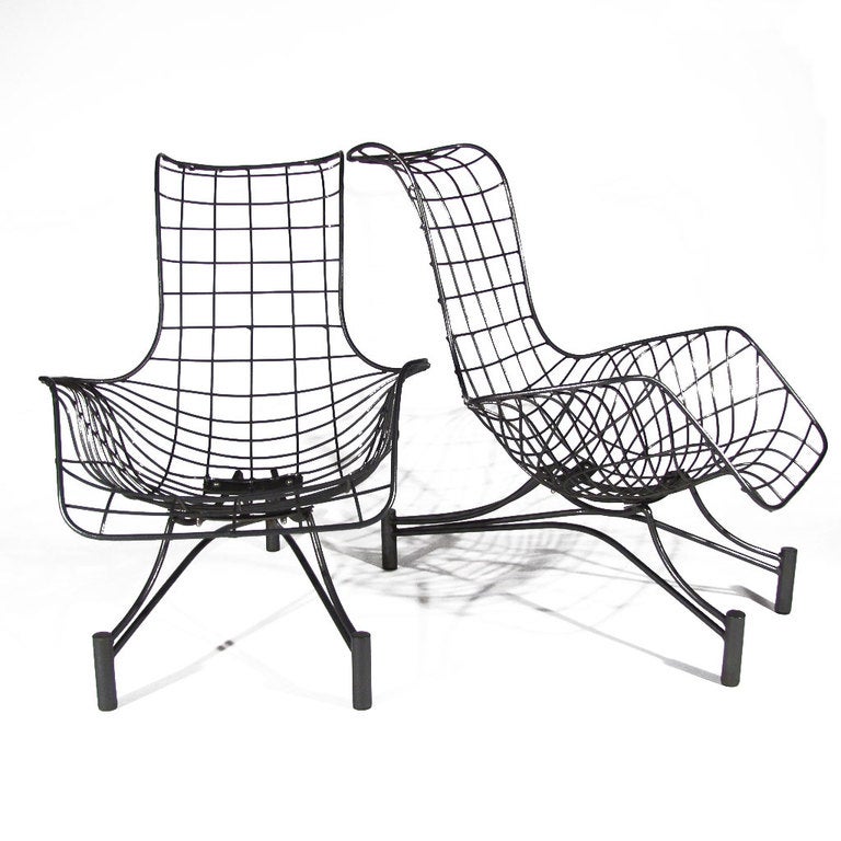 Pair Vladimir Kagan Capricorn lounge chairs. Early sculptural model of intricate hand welded steel frame producing a very comfortable form. Wheels with ease. Newly powder coated  graphite.

Overall immaculate restored condition. All welds