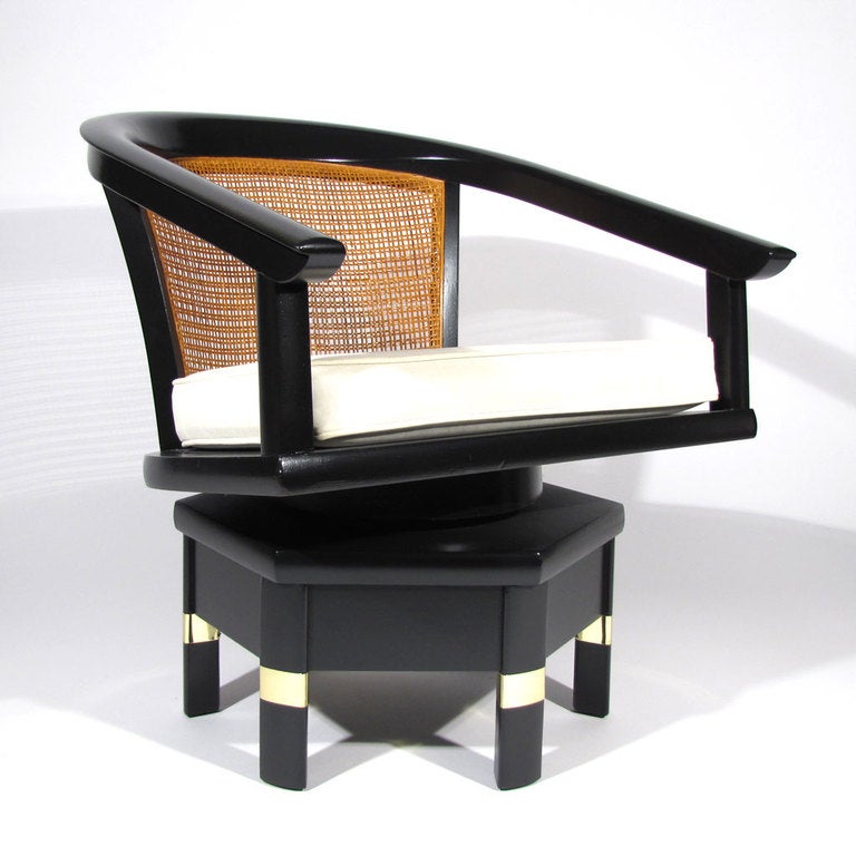 Model 5105 Jim Peed for Hickory swivel chairs. Black lacquer mahogany frames with cane backs and brass banding. Upholstered in white leather. Model 5105 labels affixed to underside. Pristine restored condition.