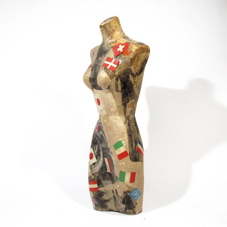 A one of a kind vintage lady who has done quite some traveling and makes a statement upon entance to any room. Being whimsical and fun, she makes a strong decorative presence with her fine figural form adorned with Vogue and Voyage.

Overall