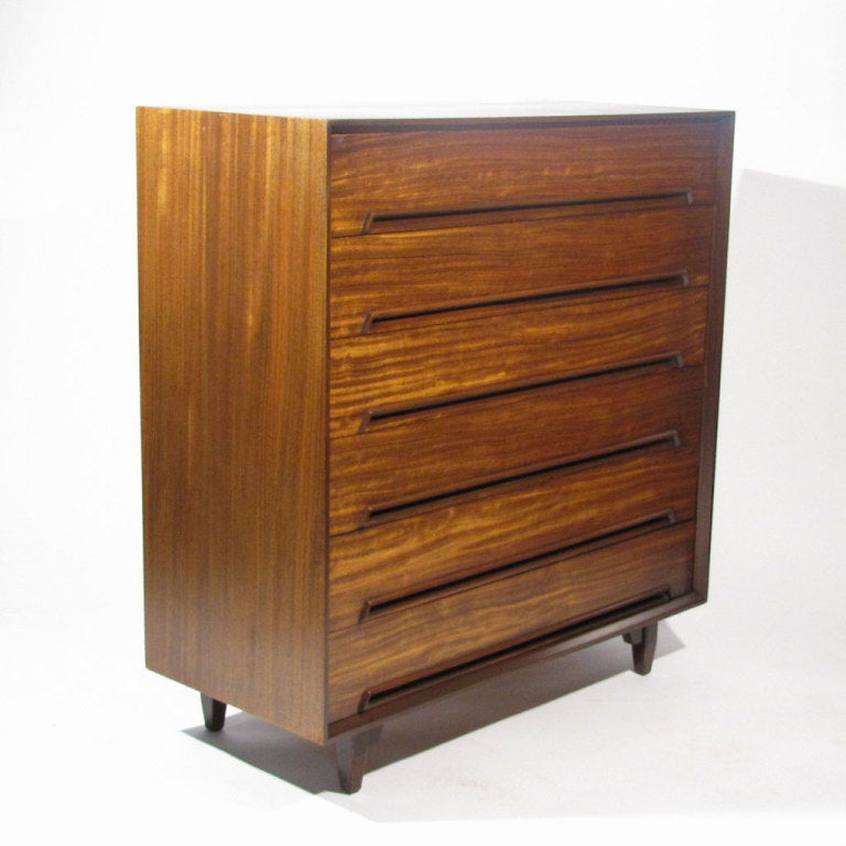 Milo Baughman Perspective six drawer tall dresser crafted in primavera wood with dramatic fiddleback figuring. Recessed long rosewood pull. It is impossible for our photography to capture the movement and colors of the beautiful