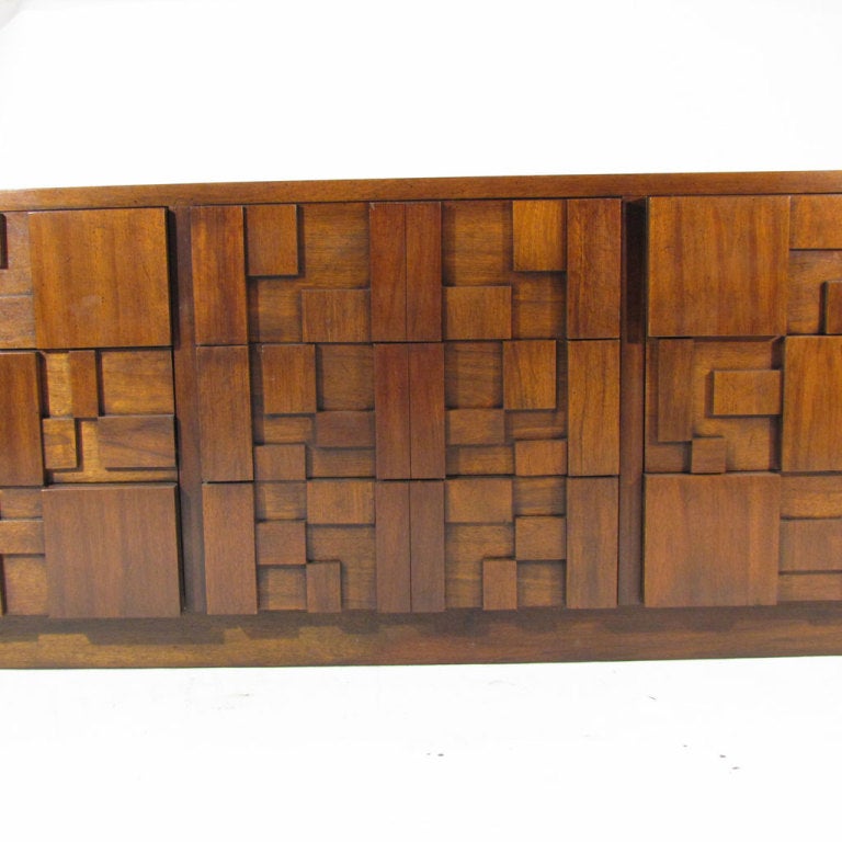 Bold brutalist Lane Mosaic dresser featuring beautiful sculptural block fronts with a myriad of walnut colors and patterns. We can color lacquer if desired.

Overall excellent restored condition.