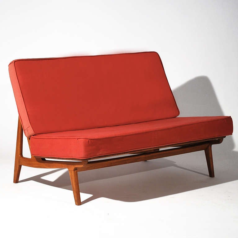 Two seat sofa designed by Ole Wanscher for France & Daverkosen circa 1954.  Cushions are slipcovered and would have to be re-upholstered. The beech frame is in excellent condition and has a warm honey color.