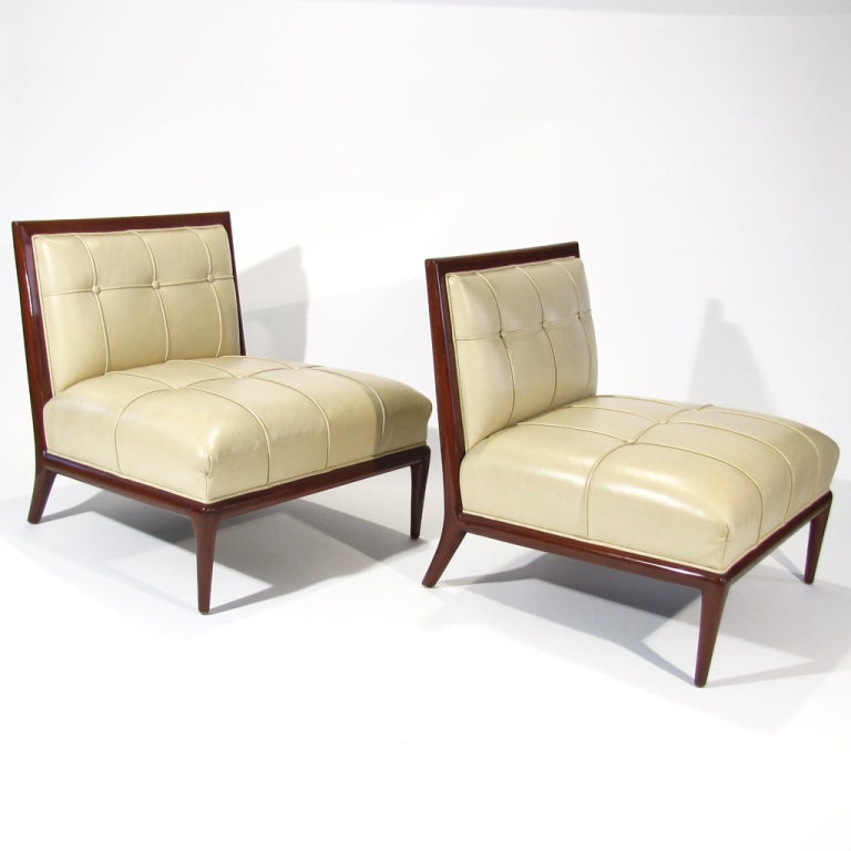 An attractive pair of vintage Nancy Corzine slipper chairs in walnut with parchment leather upholstery. Classic Corzine style and comfort along with superior craftsmanship.

Overall excellent vintage condition - Please call Eddy at 410.299.9147