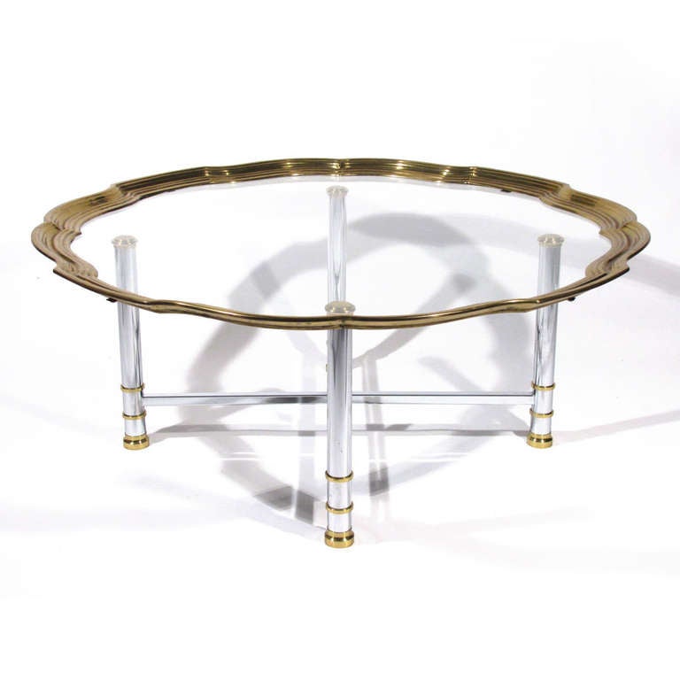 Beautiful LaBarge scalloped coffee table. Satin chrome and polished brass base support large top.

Excellent condition. Please call Eddy at 410.299.9147 for detailed condition report, shipping inquiries, or with any general questions.

