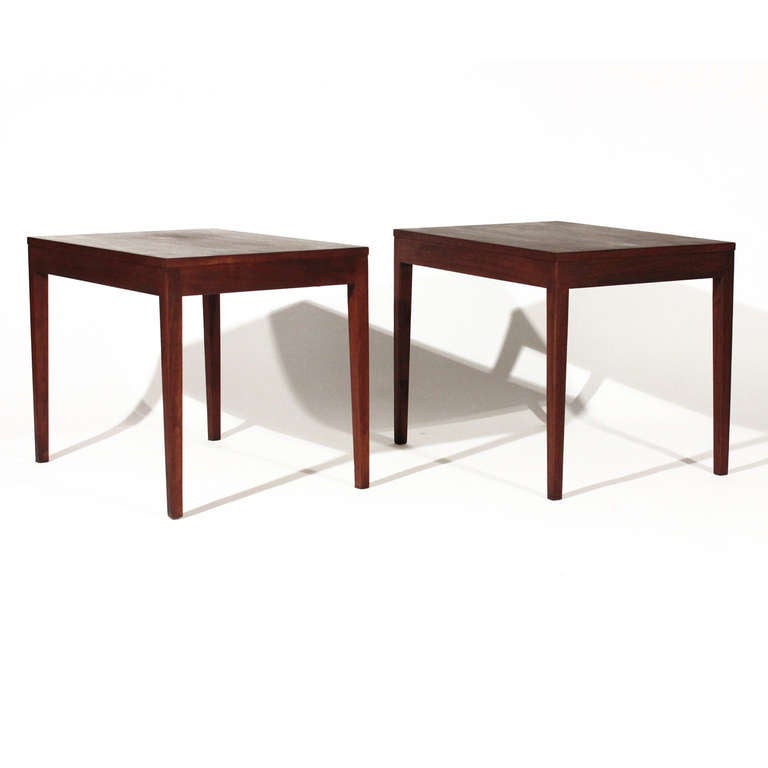 Nice pair of walnut end tables designed by George Nelson for Herman Miller circa 1958. Simple clean lines give these an understated elegance. Labeled. In  very good re-finished condition.