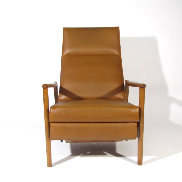 Handsome and very early model Milo Baughman for Thayer Coggin recliner with pristine ash frame. Upholstered in original mocha leatherette, which is in perfect condition. We can assist with new upholstery if you like. Exceedingly comfortable with the
