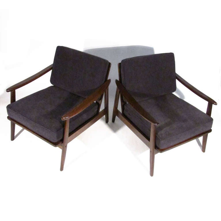 Pair Mid-Century lounge chairs in sharp espresso ash. Nice angular form, very comfortable. Newly upholstered in soft obsidian. See matching end tables, coffee table, and day bed in separate postings.

Immaculate restored condition. Satin lacquer