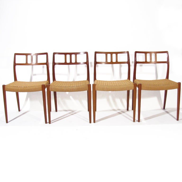 Handsome set of twelve Niels Moller Danish model 79 dining chairs. Deep amber teak teak with graceful curves. Only ten left.

Frames in excellent condition. New upholstery necessary.