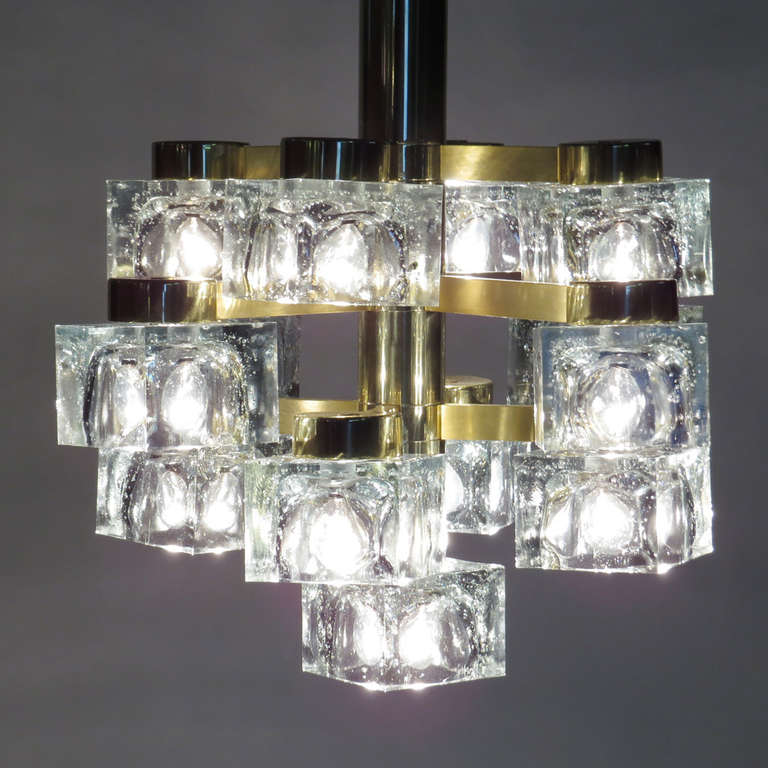 Gaetano Sciolari chandelier consisting of thirteen large glass ice cube form globes on brass fixture. 4.25