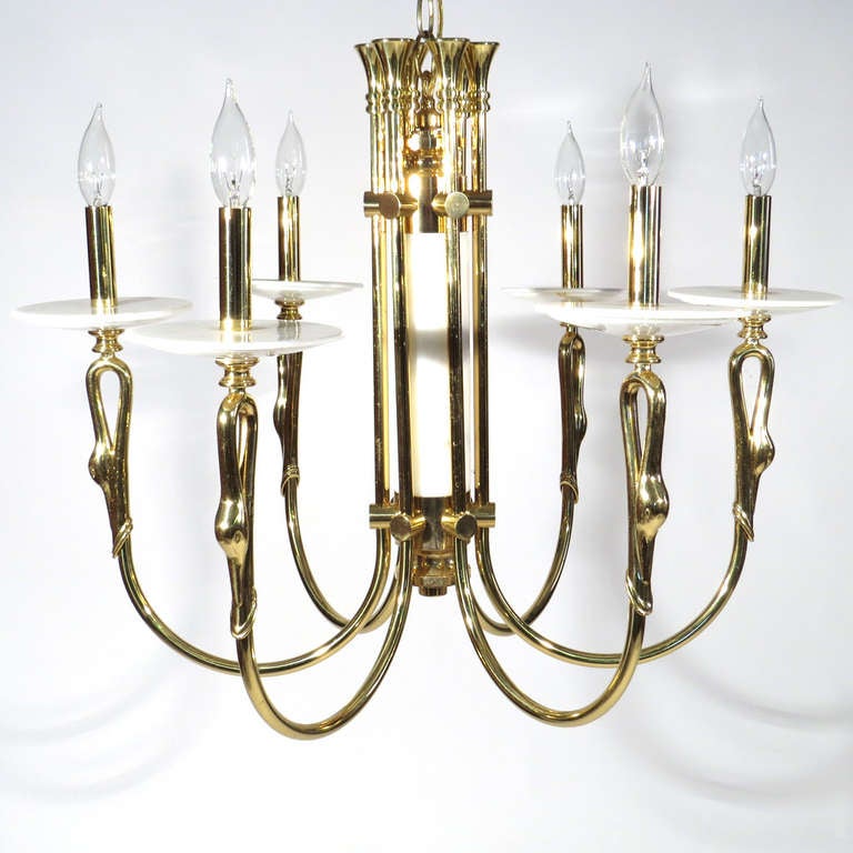 Elegant brass and marble six light chandelier. Marble central shaft and six marble bobeches. Exceedingly heavy and well crafted.

Re-wired. Fine vintage condition.