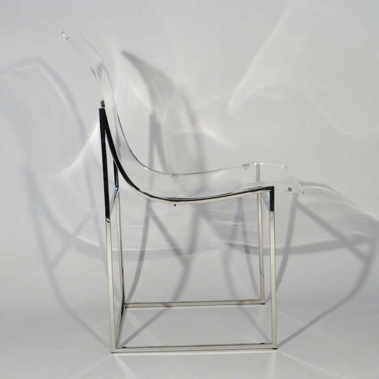 Twelve Milo Baughman for Thayer Coggin Lucite dining chairs. Designed in 1975. Sculpted Lucite seat supported by chrome frame. 

Immaculate condition.