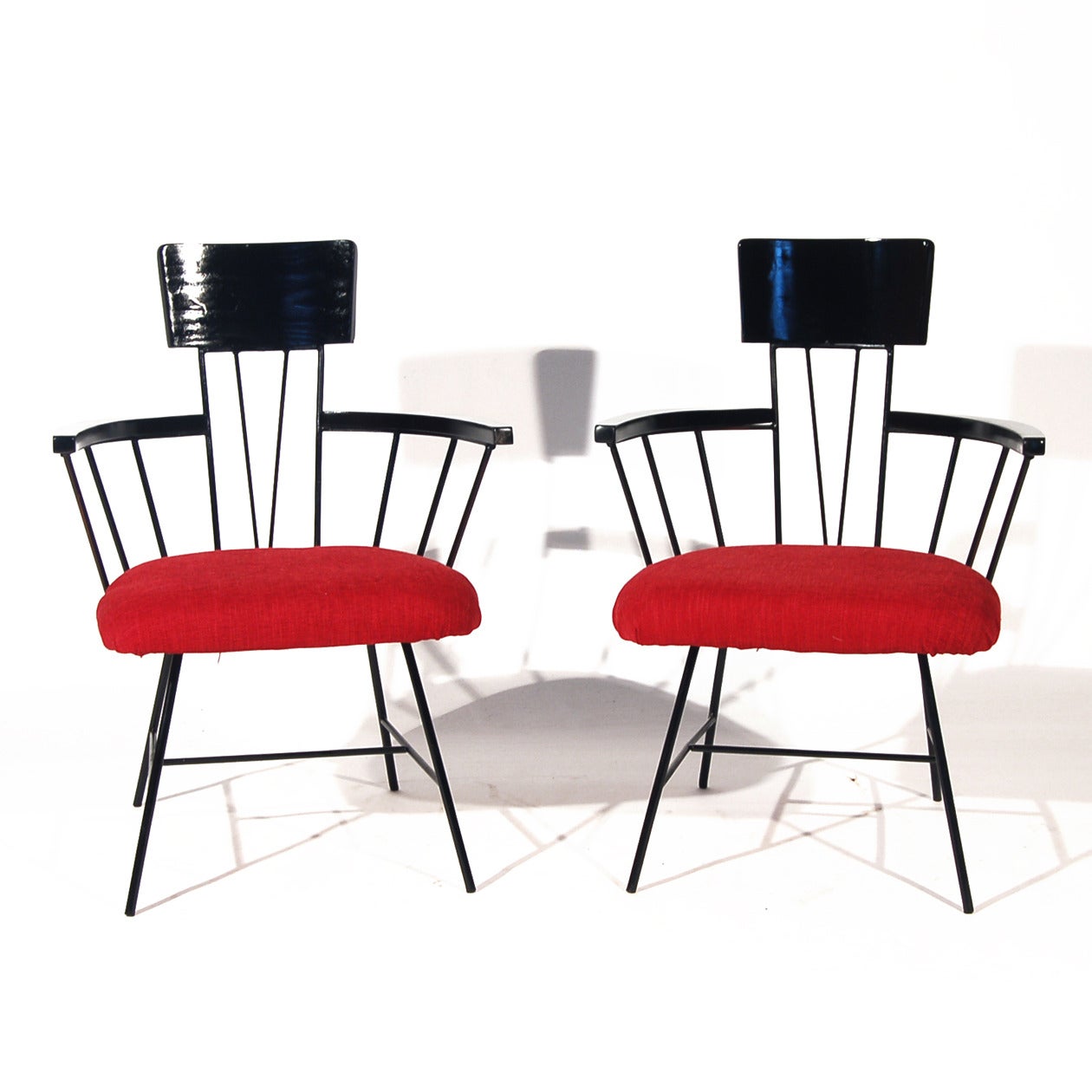 Striking pair of 1950's side or dining chairs by Richard McCarthy for Selrite.  Similar in style to Paul McCobb's Allegro chairs for Woodward but we think these have a little more flair. They have been restored, (re-envisioned), with a black lacquer
