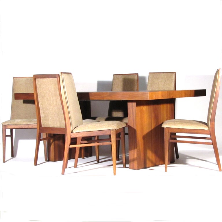 Handsome set of eight Dillingham dining chairs in walnut. Newly upholstered in soft tan material. Baughman designed the Esprit line for Dillingham, a top notch producer, and this company produced the flashy Pierre Cardin line as well. We also have
