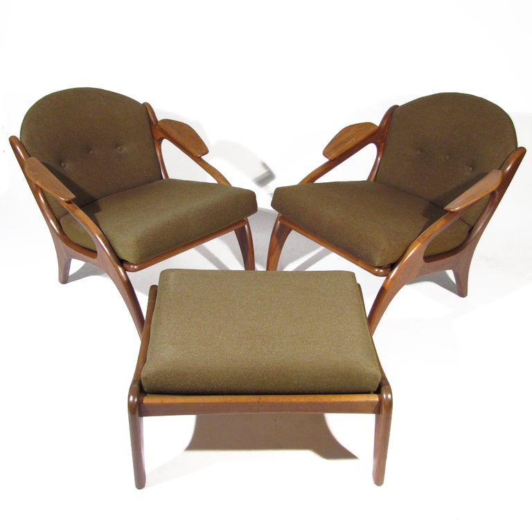 Pair of sculptural Adrian Pearsall for Craft Associates Model 2249-C Chair lounge chairs and matching ottoman in beautiful deep walnut. Ottoman is a bit wider than chairs, space for two.  Organic form frame culminates in a very comfortable chair.