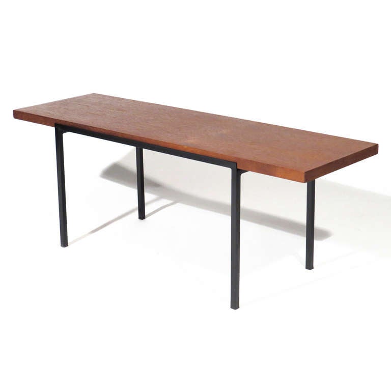 Edward Ludwig for Lotos Werkkunst diminutive walnut table or bench in walnut with black welded iron frame.