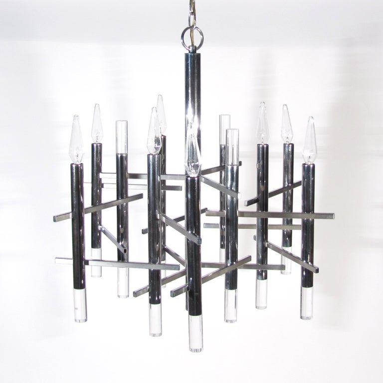 Gaetano Sciolari Bravura Cartesian chandelier consisting of chrome and lucite tipped rods with nine lights and brushed steel horizontal rods orbiting a larger centered chrome column. Sciolari label affixed to original ceiling plate.

Fine vintage
