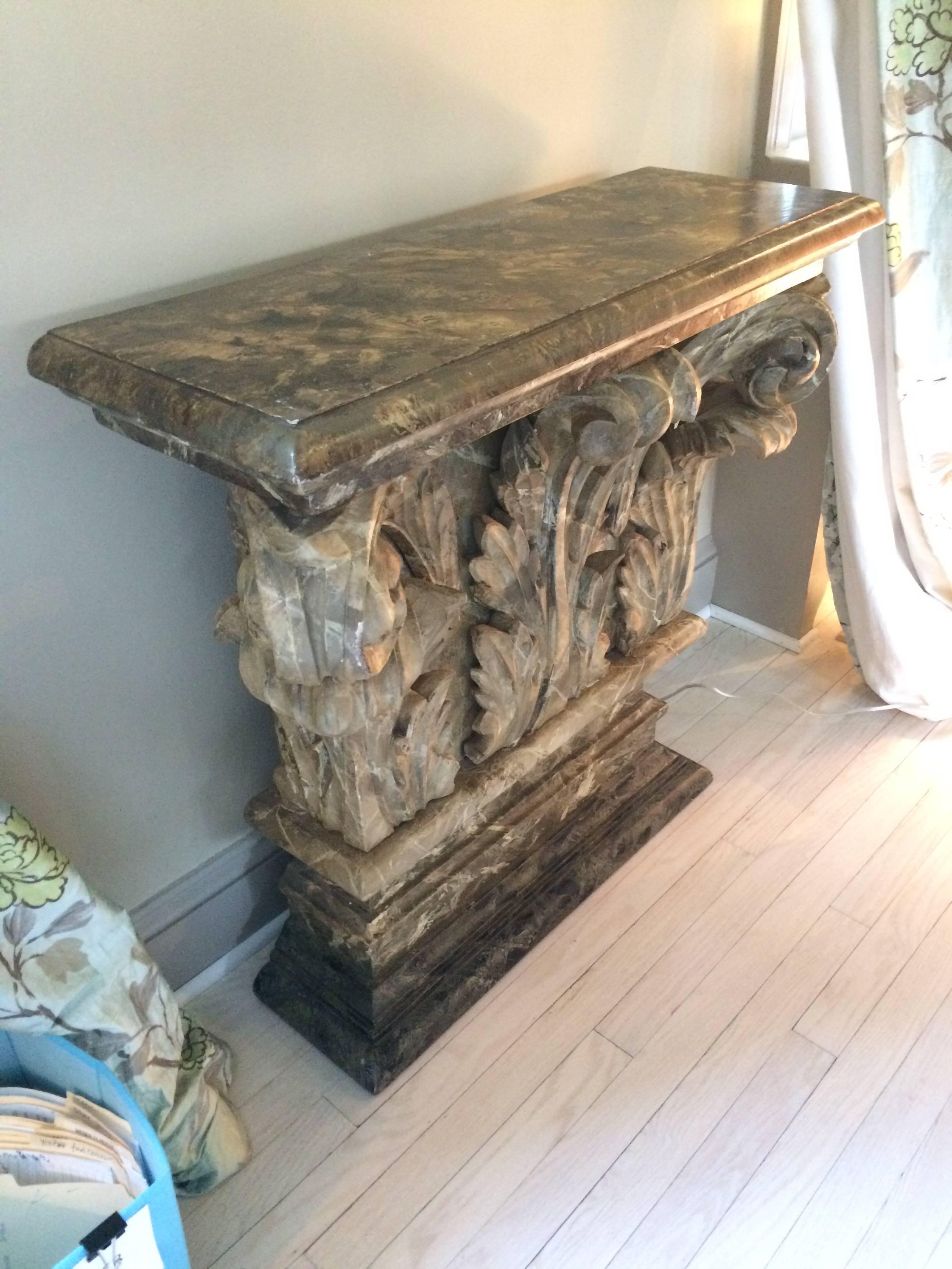 Two very impressive carved wood painted consoles from France, circa 1910, having ornate neoclassical style bases and narrow rectangular marbleized tops.
Originally purchased at the NY antique fair for 10K about 12 years ago.
