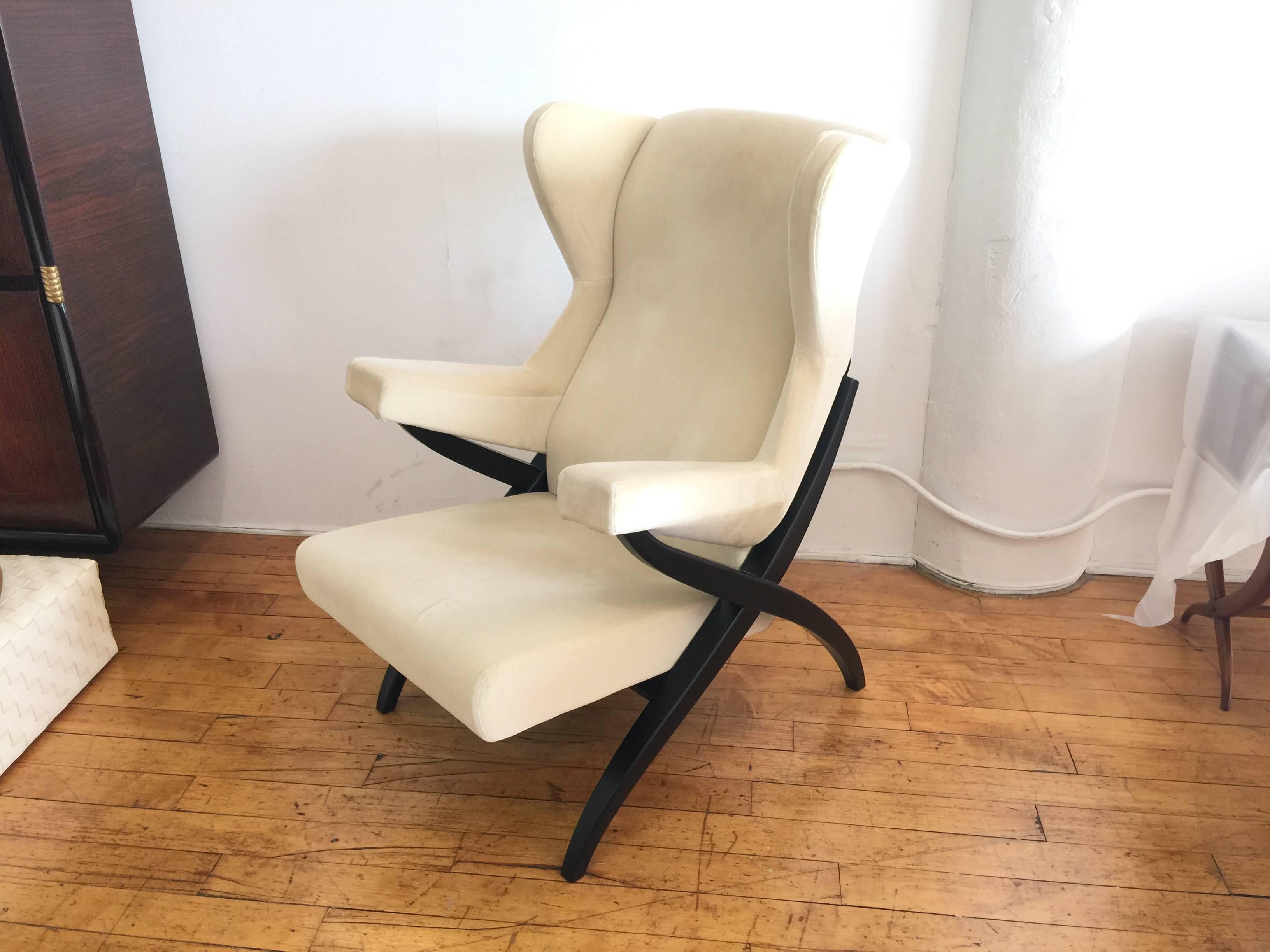 Fiorenza Italian lounge chairs designed by Franco Albini, upholstered in beige cotton velvet, manufactured by Arflex. The retail price for this comfortable Italian designer lounge chair is over 6,000$ today. This chair is circa 2010 so it is still