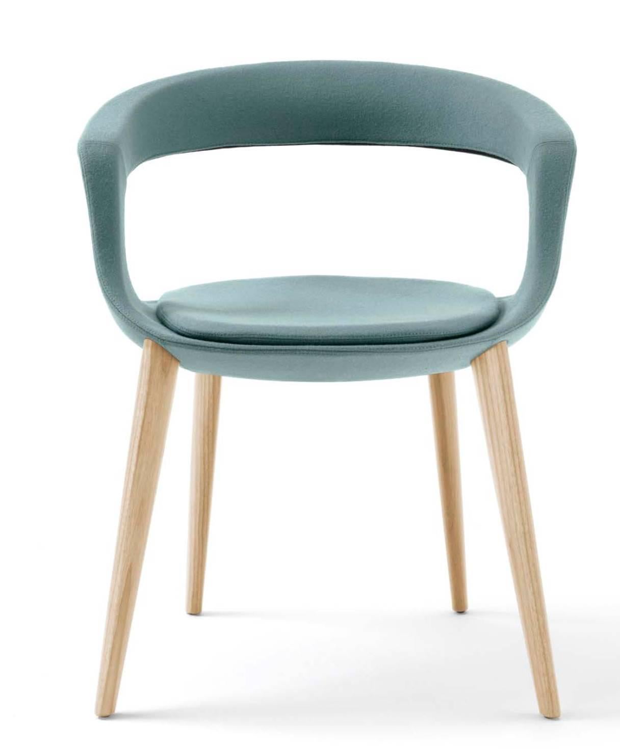 Italian modern dining room chair made of wood legs in Canaletto walnut or ash and soft leather upholstery, inner steel frame, expanded polyurethane padding. Upholstery can also be in felt, or technical material. Available with a low back (shown in