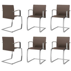 Set of Six Italian Leather Dining Room Chairs with arms chrome structure