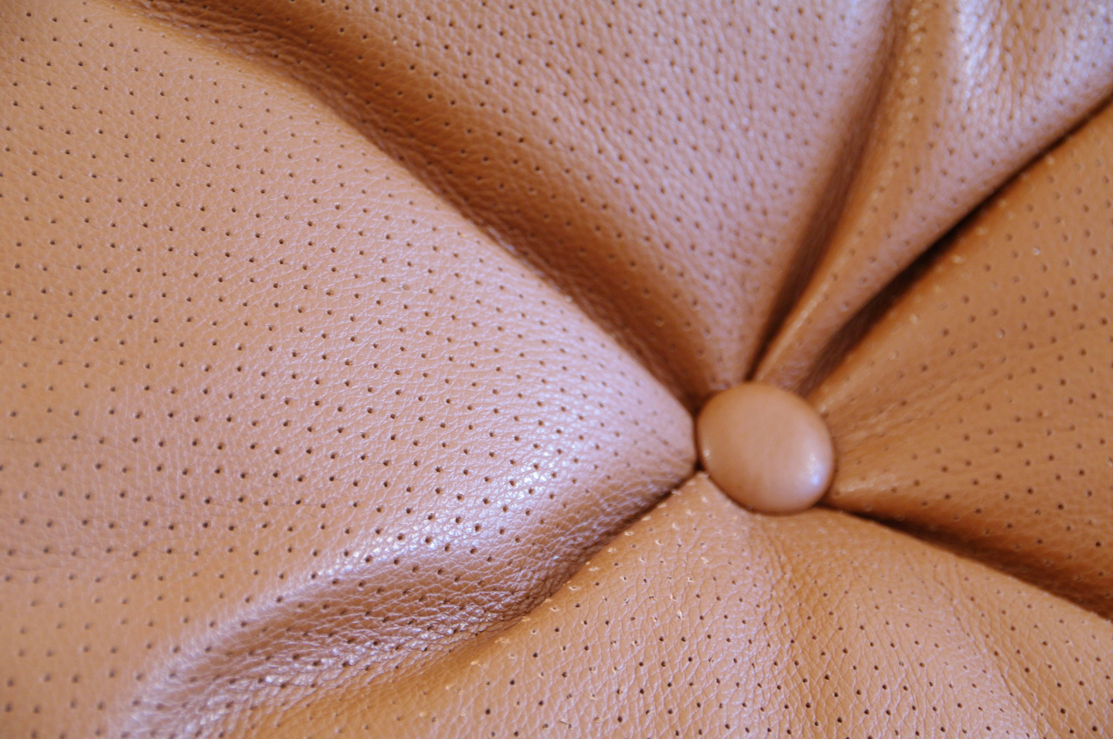 Beautiful large perforated leather round throw in pillow with button, 21.65