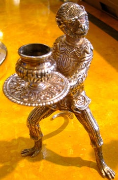 Pareja de candeleros mono americanos Tiffany de plata de ley