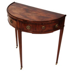 Petite demilune side table with 2 drawers.