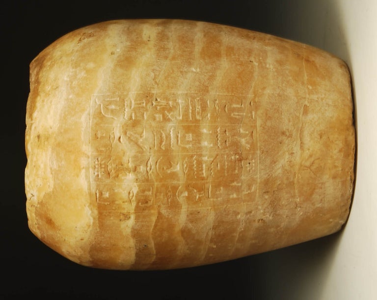 Fabulous honey color deep banded alabaster jar carefully inscribed with four columns of rhythmic  hieroglyphic text.

Canopic reads: Owner PairKap: Words to be recited by Nephthys: I protect the secrets, as one who makes 
