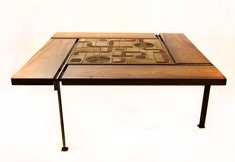 Rare and unusual coffee table.
 
Designed by Svend Aage Jessen in the 1960's, Denmark.

With beautifull ceramic work from Sejer pottery, Denmark and
rosewood.

square 144 cm,  height 46 cm.

Very good original condition.

