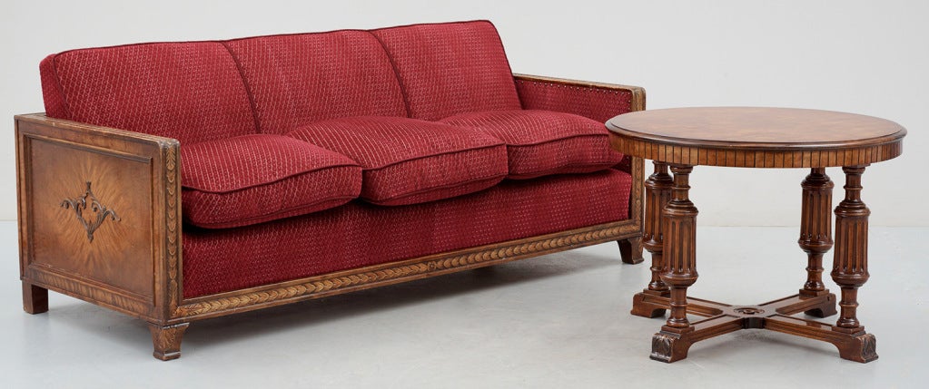 Nice art deco sofa from Stockholm, Sweden.
In stained Birch and red fabric.
Very heavy and solid made.
Comes with matching table.