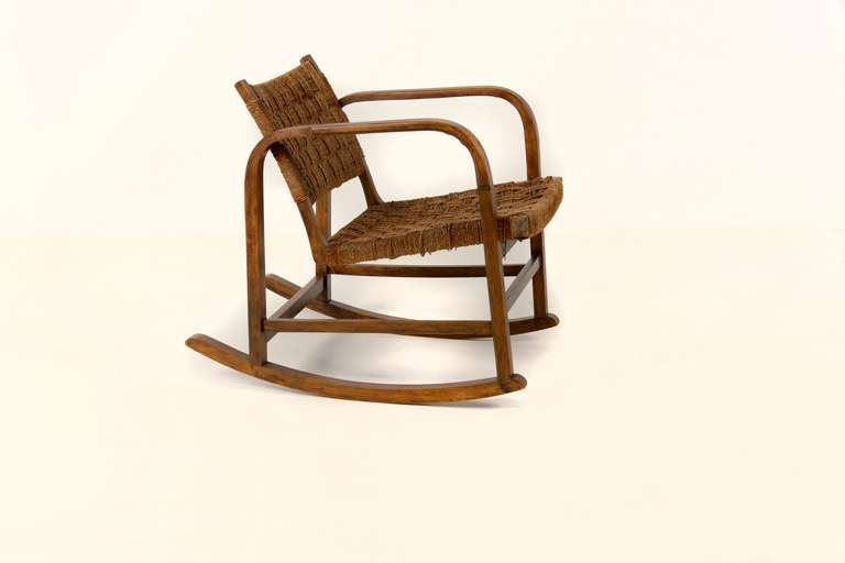 Rocker chair.
Designed by Swedish Designer Eskil Sundahl, 1930′s.
H:  70 cm, B: 57 cm, D:  80 cm.
Made by Swedish company, SMF, Bodafors.
