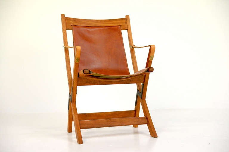 Jens Harald Quistgaard, 1919-2008.
SAX chair - Prototype, has never been put into production. 
Chair with folding solid teak frame, seat and back mounted with full-grain leather, full-grain leather armrests. 

The chair was designed in the 1970s