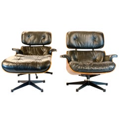 2 Matching Rosewood Lounge Chairs & Ottoman, Charles Eames.
