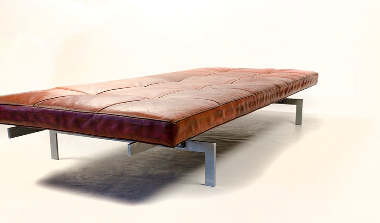 Pk80 daybed in original red leather.
1st edition.
Designed by Poul Kjaerholm for E. Kold Christensen (EKC), Danmark in 1957.
Very rare cause almost all daybeds are in black, brown or cognac leather.
This one is in red leather with was also used on