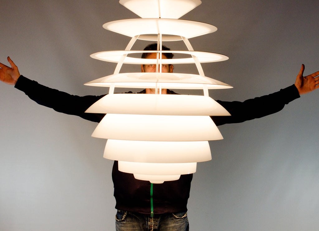 Denmark
Denmark 1990's
Designed by Kurt Nørregaard for Louis Poulsen based on sketches by Poul Henningsen, called 'Gigant' in Denmark at first but later crowned 'LP Centrum'.
The pendant consists of 10 shades, which have been designed according