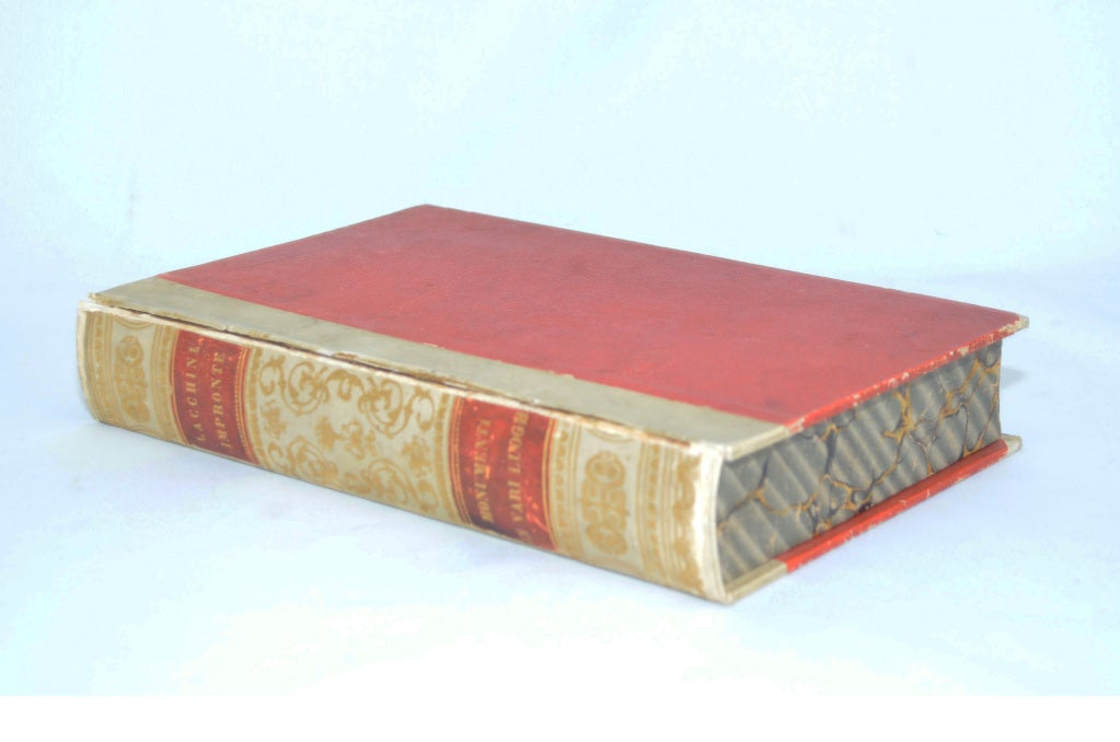 Collection of Plaster Medallions Mounted in Faux Books