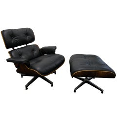 670 Lounge and 671 ottoman in rosewood by Charles and Ray Eames 