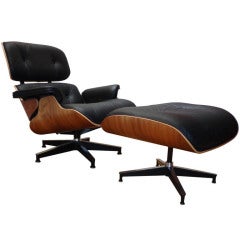 670 Lounge and 671 ottoman in rosewood by Charles and Ray Eames