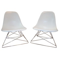 Two Low Side Shell on a Chrome Rod Base (LSR) by Charles & Ray Eames